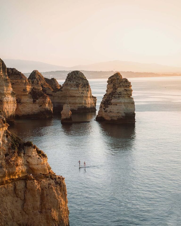 sunrise-view-of-ponta-da-piedade-with-stand-up-pad-2MRDCMT.jpg